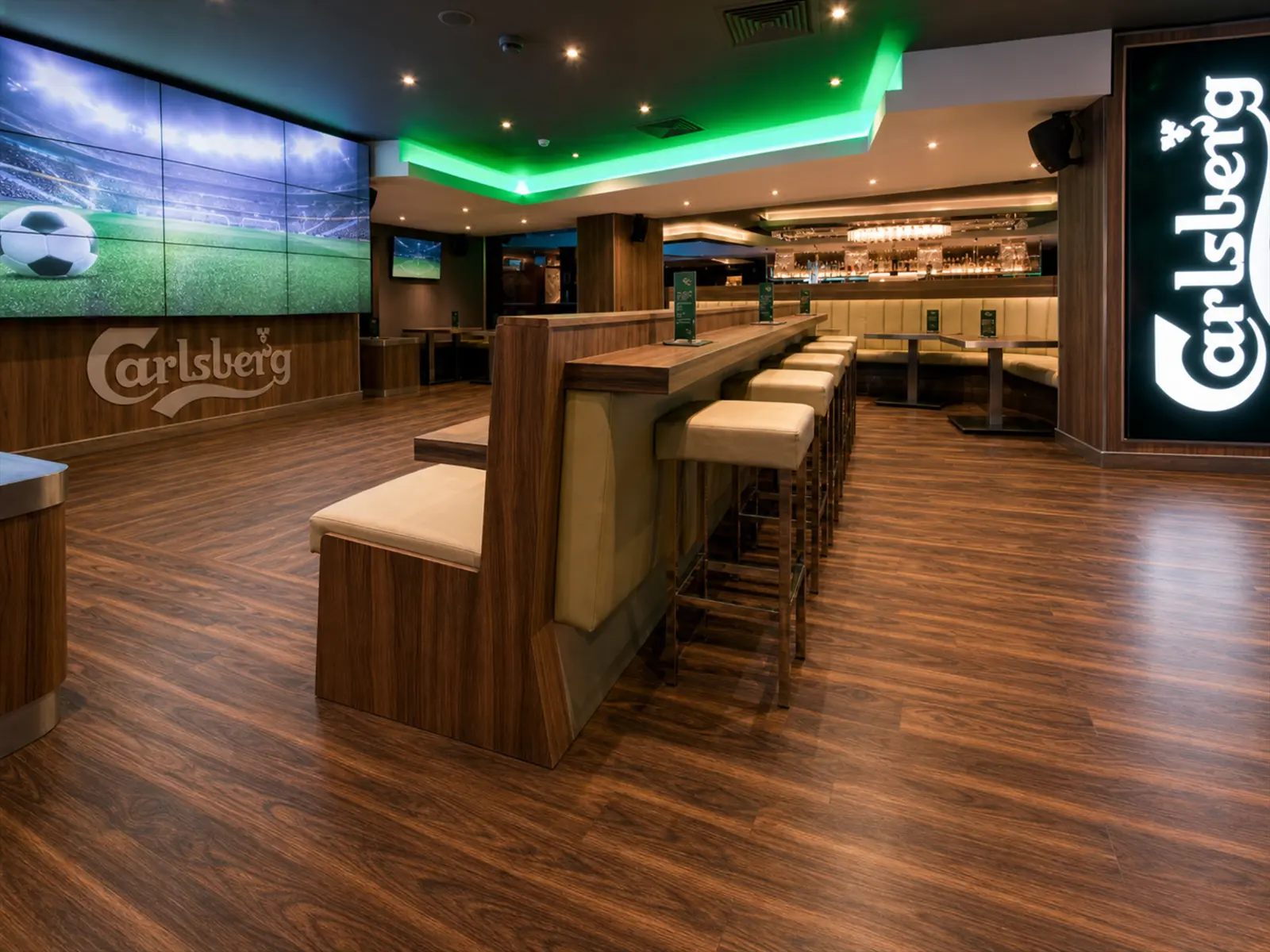 Carlsberg Sports Bar - Hospitality flooring project by WH Flooring & Tiling